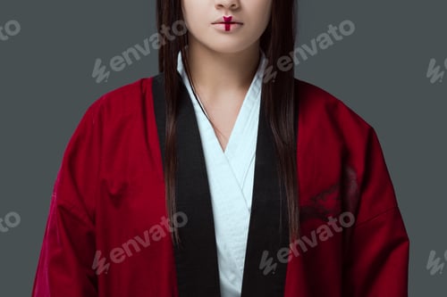 Preview: cropped shot of young asian woman with make up wearing kimono isolated on grey