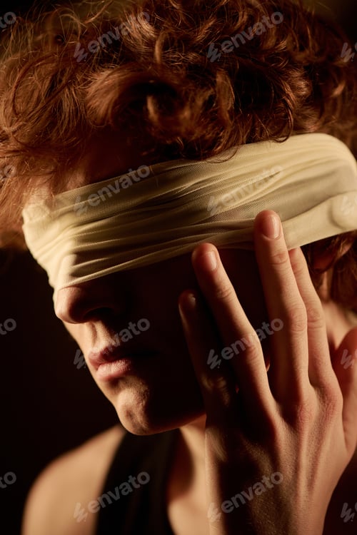 Preview: Man Adjusting Bandage