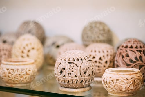 Preview: Goa, India. Caskets Of Stone On Shelf In Store. Goods For Tourists