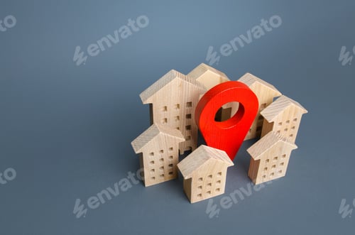 Preview: Wooden houses and a red location pin.