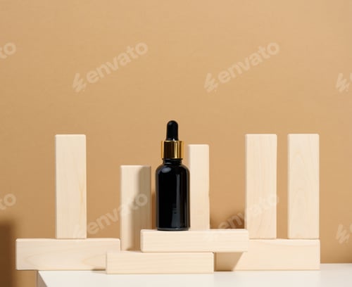 Preview: Brown glass bottle with pipette stands on a white table. Cosmetics SPA branding