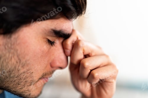 Preview: Young man suffering from stress, depression, and mental health issues