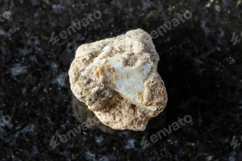 Preview: sample of raw achtarandite mineral on black