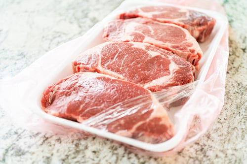 Preview: Unpacking Rib Eye Steak in Modern Kitchen