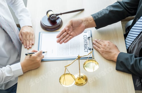 Preview: Lawyer hand holding pen and providing legal consult business dispute service at the office