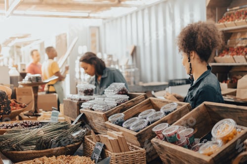 Preview: Young black women selling healthy food at farmers market