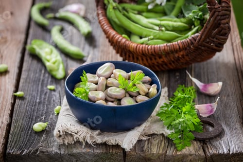 Preview: Tasty broad beans with parsley and garlic. Healthy country snack.