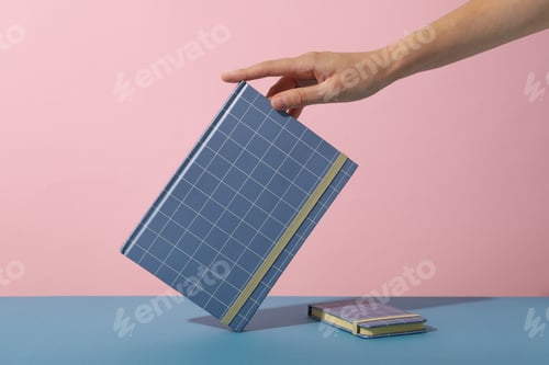 Preview: Notepads and female hand on pink background