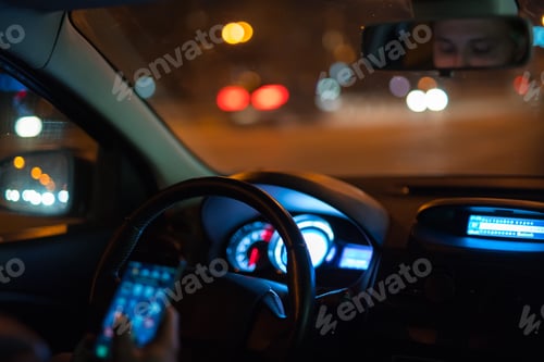 Preview: The man phone in the car. Evening night time