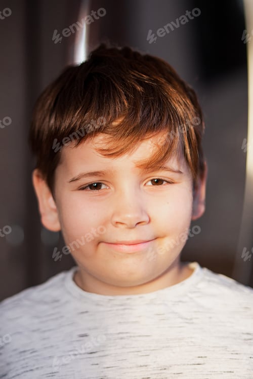 Preview: Smiling face . Sunshine portrait. My son