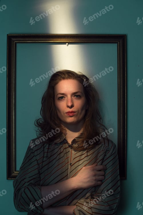 Preview: expressive caucasian female portrait,framed in frame