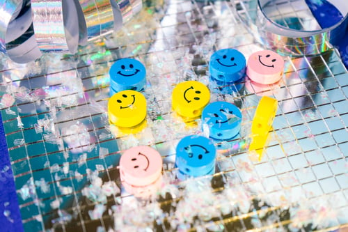 Preview: Colorful Smiley Faces on a Silver Background