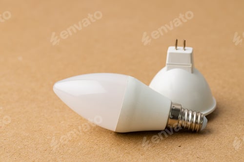 Preview: Light bulb on craft paper background close up