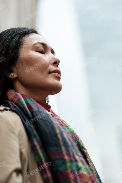 Preview: Woman breathing deeply feeling relaxation and inner peace