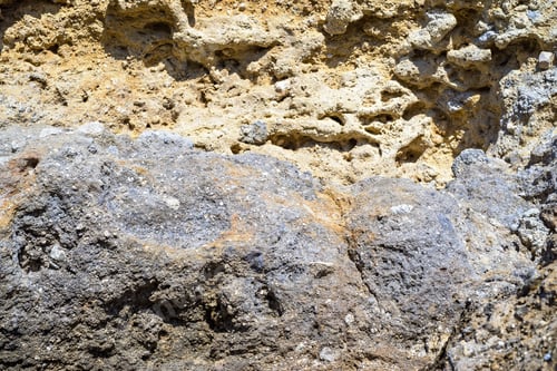 Preview: Abstract Texture Of Rocky Stones Closeup With Indistinct And With The Sharp Image Of A Surface For