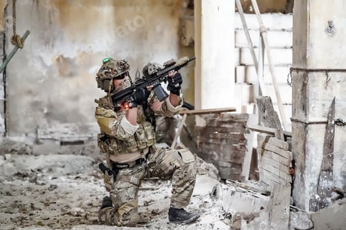 Preview: Soldier in full US MARSOC armed with assault rifle run through the abandoned building. Military