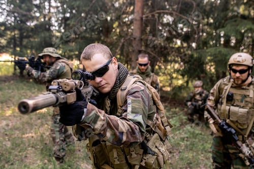 Preview: Armed soldiers examining terrain