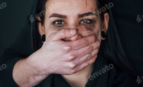 Preview: Man's hand covering her mouth. Kidnapped woman is threatened by guy