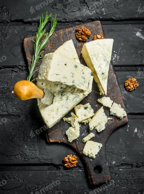 Preview: Blue cheese with nuts and rosemary branches.