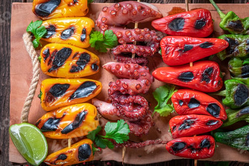 Preview: Healthy grilled skewer cooking on grill with metal grate.
