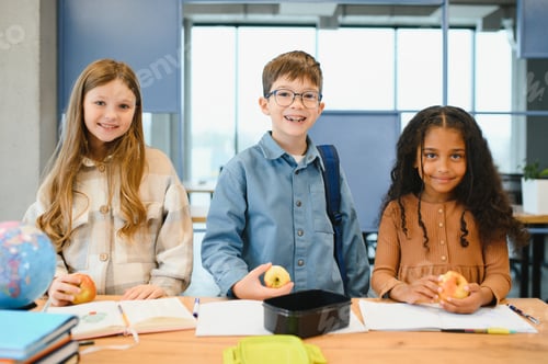 Preview: Education is power when selecting food for health. Happy kids take snack break.