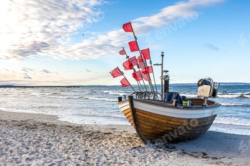 Preview: Seascape with a boat on the seashore.