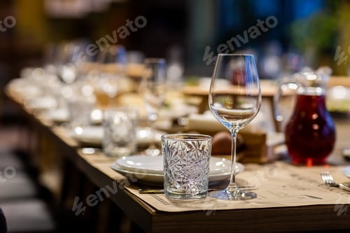 Preview: Tables set for an event party or wedding reception. luxury elegant table setting dinner in a re