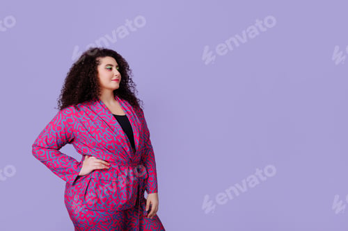 Preview: A young woman with a plus size figure with an Afro hairstyle
