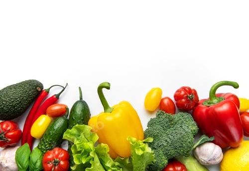 Preview: Fresh colorful organic vegetables composing a healthy food border