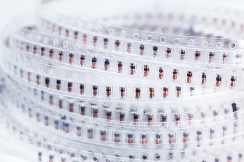 Preview: Plastic tape with capacitors electronic devices