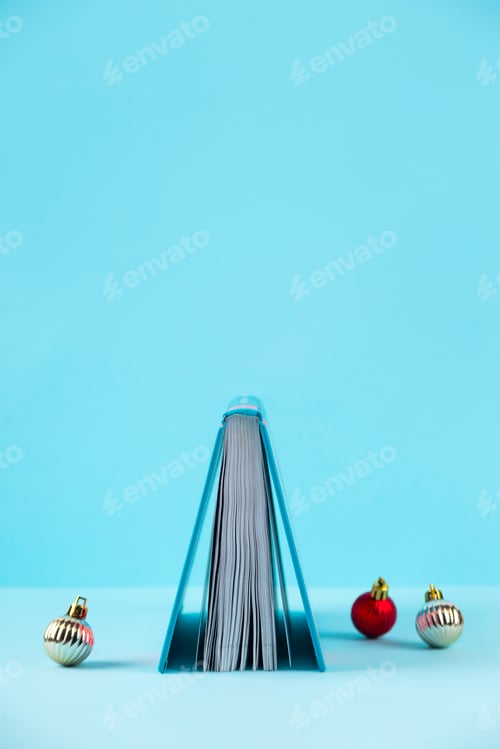 Preview: Book shape as Christmas tree. Creative minimal concept.
