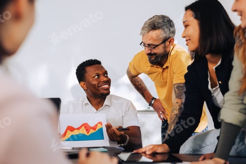 Preview: A multicultural businessman is having presentation at boardroom.