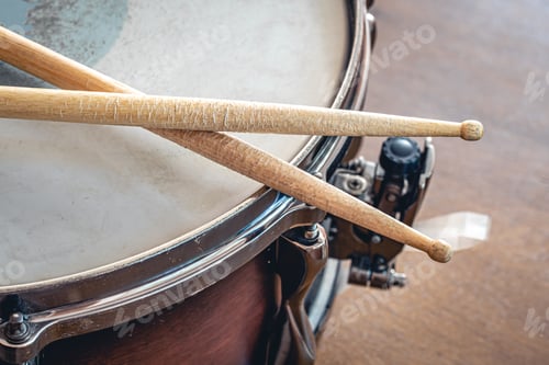 Preview: Close-up, drumsticks on a blurred background.