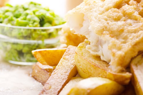 Preview: Traditional British street food fish and chips with mushy peas o