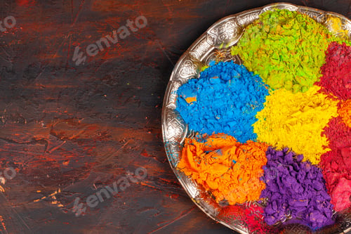 Preview: A bunch of colours placed on wooden background close up