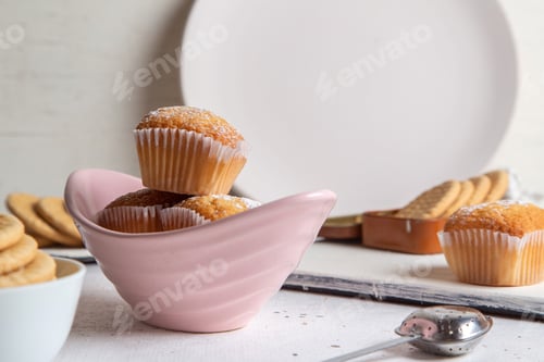 Preview: a front view little tasty cakes with sugar powder and cookies on the white background sweet tea