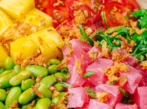 Preview: Fresh and colorful salad bowl featuring tropical fruits and vegetables