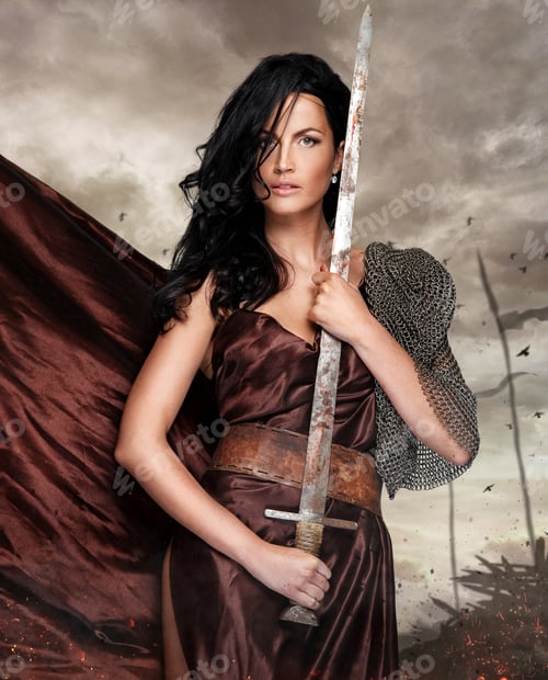 Preview: Sexy brunette female in a war queen costume.