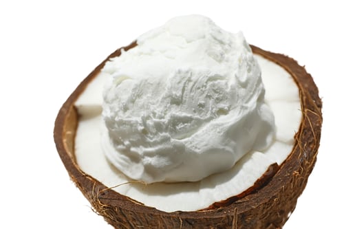 Preview: Coconut half with creamy meat inside, on white background