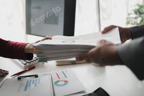 Preview: Two company employees handing over papers to each other, marketing staff handing over marketing anal