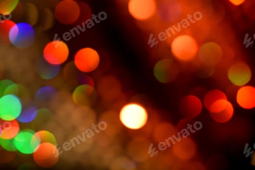 Preview: Abstract colorful glowing rainbow bokeh with red side.