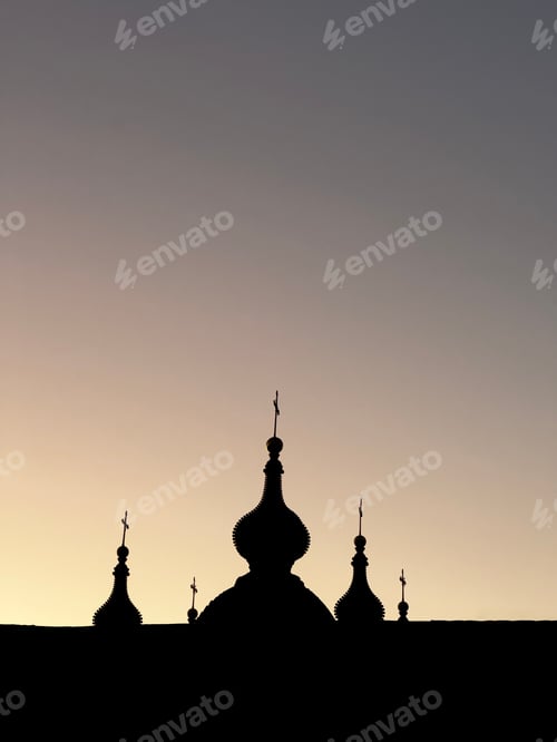 Preview: Silhouette of christian orthodox church domes at sunset