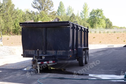 Preview: In order to recycle garbage, a metal container trash dumpster is used