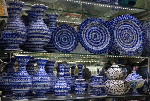 Preview: A showcase with oriental ceramics of blue color. Ceramic decorative