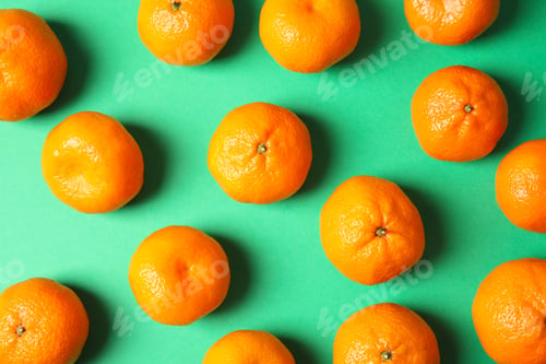 Preview: Flat lay composition with ripe tangerines on color background