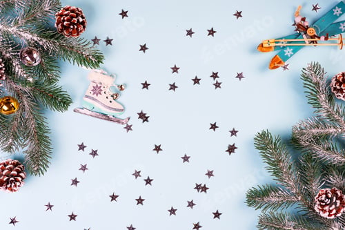 Preview: Christmas frame-postcard from decorative Christmas toys, fir, cones, balls, golden stars, sledge