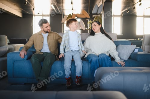 Preview: Family trying new sofa in furniture store