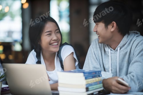 Preview: Group of happy friends student talking about knowledge in cafe