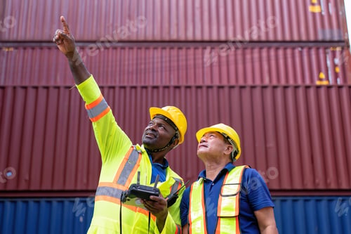Preview: Engineer working in container storage yard fly drone looking top view check container arrangement