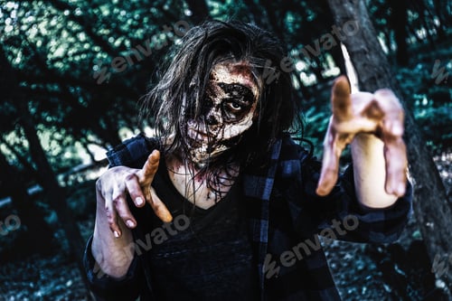 Preview: Scary zombie with bloody face outdoors. Halloween monster
